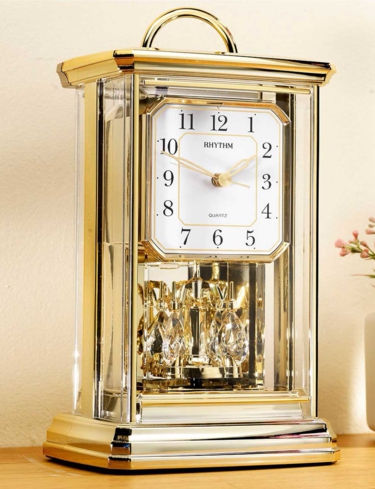 Gilt Jewelled Rotating Pendulum Clock